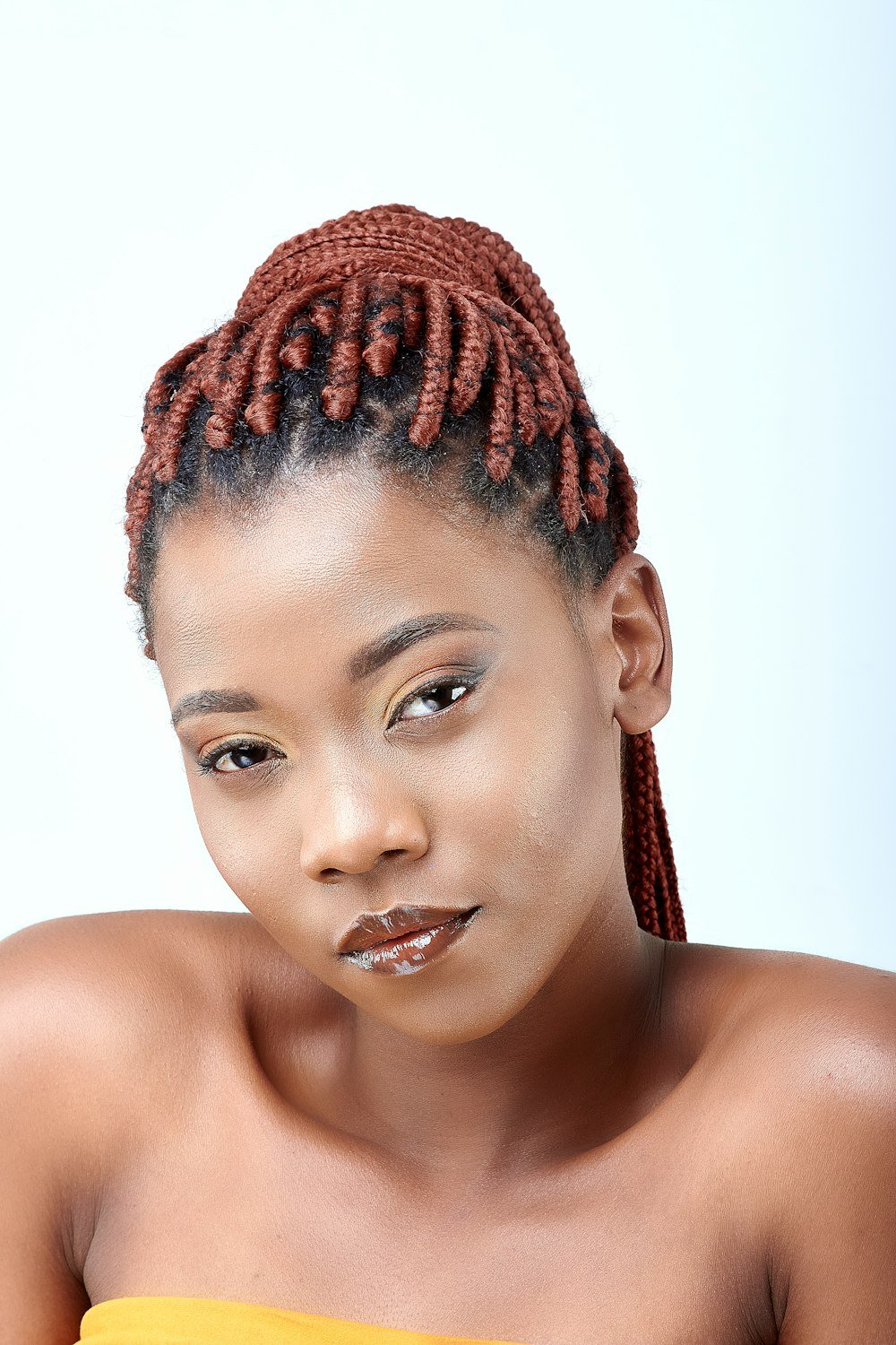 Woman with copper braided updo